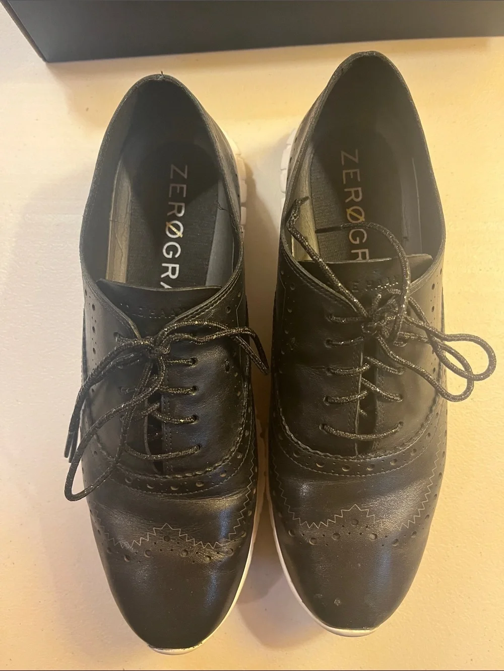 Cole Haan Black Leather Wingtip Sneakers with White Sole